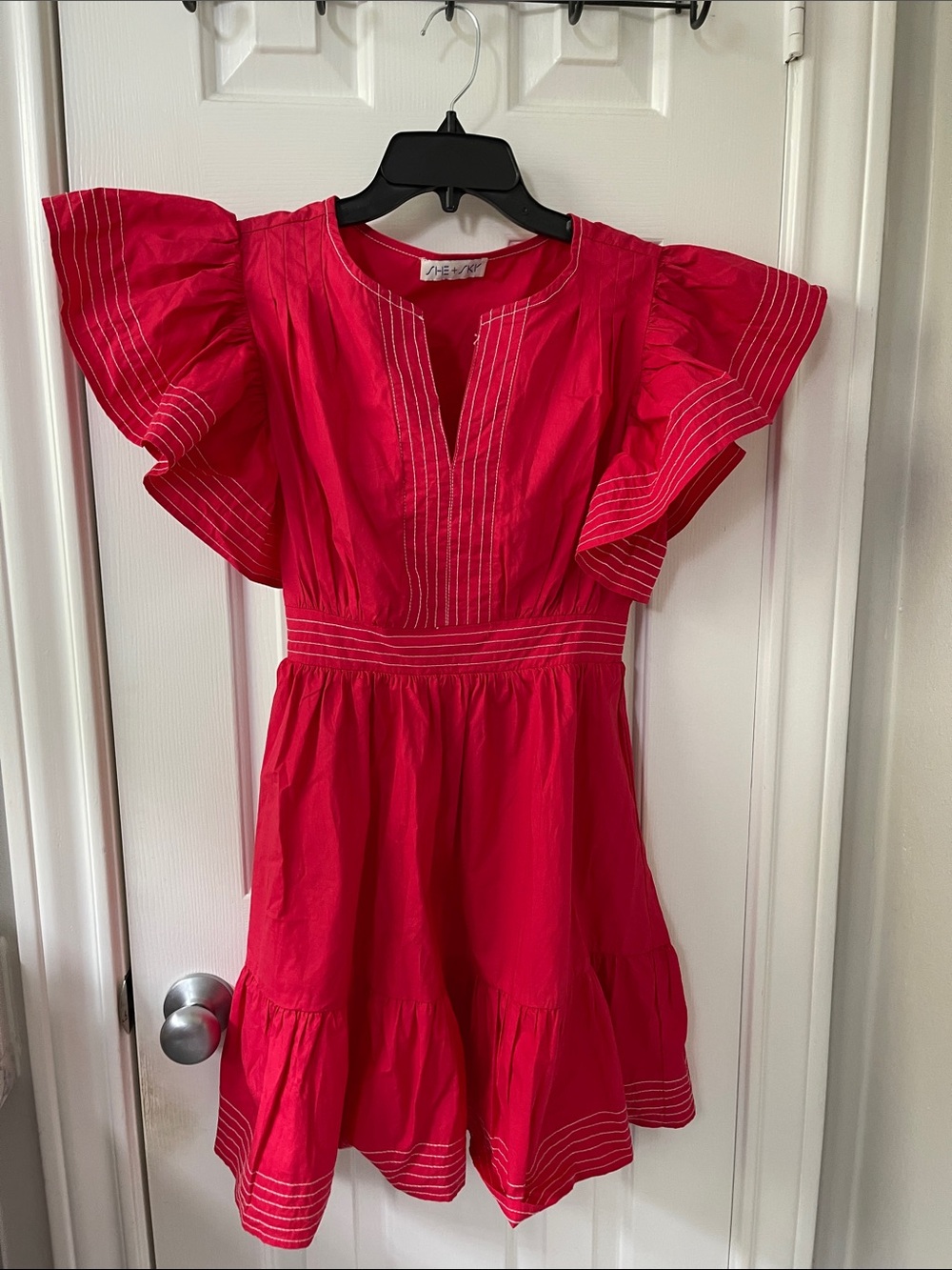 Womenโs red Flutter Sleeve Dress